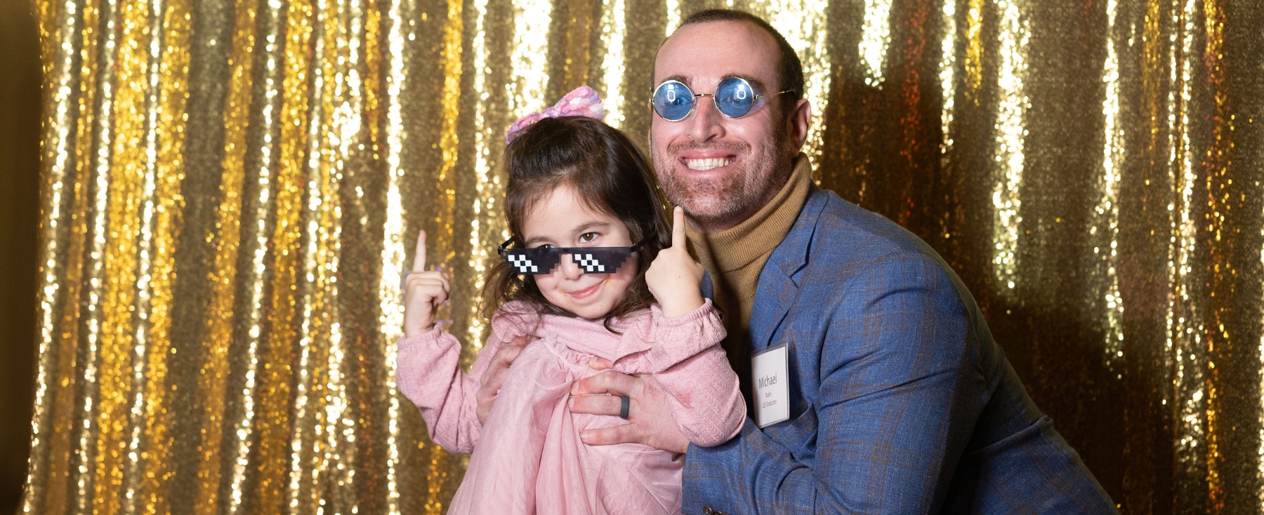 SCPS alum Michael Dubin poses for photograph with family 